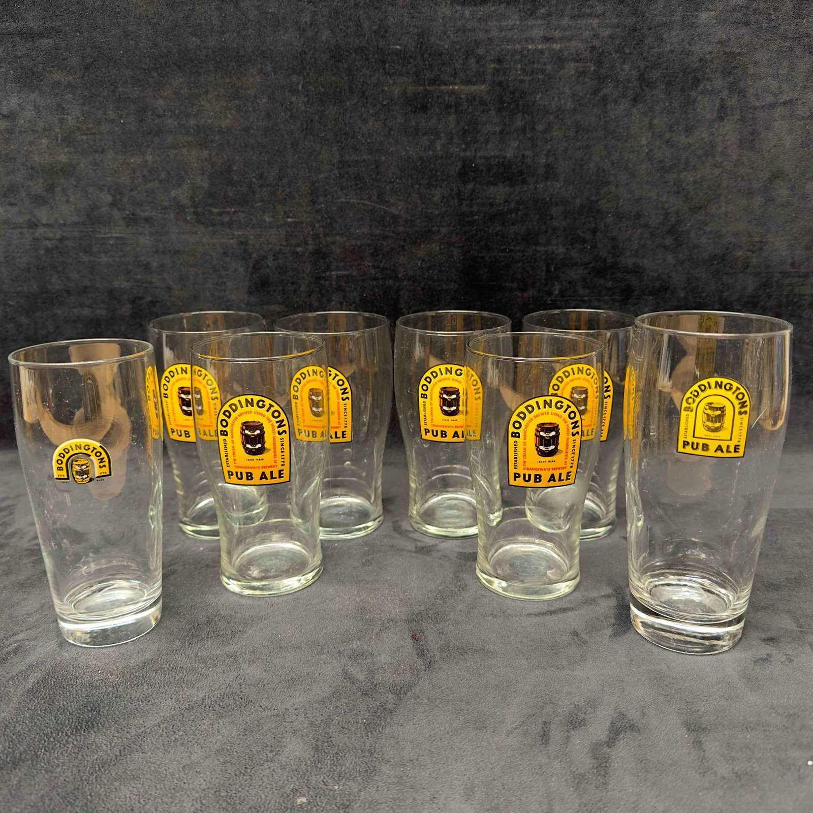 Boddingtons Pub Ale Beer Brewery Glass Collection Set Lot of 8 Eight Cocktail Pint Glasses: Boddingtons Pub Ale Beer Brewery Glass Collection Set Lot of 8 Eight Cocktail Pint Glasses. These pint glasses show no noticeable signs of chips, breaks, or cracks. They are a little dusty and dirty c