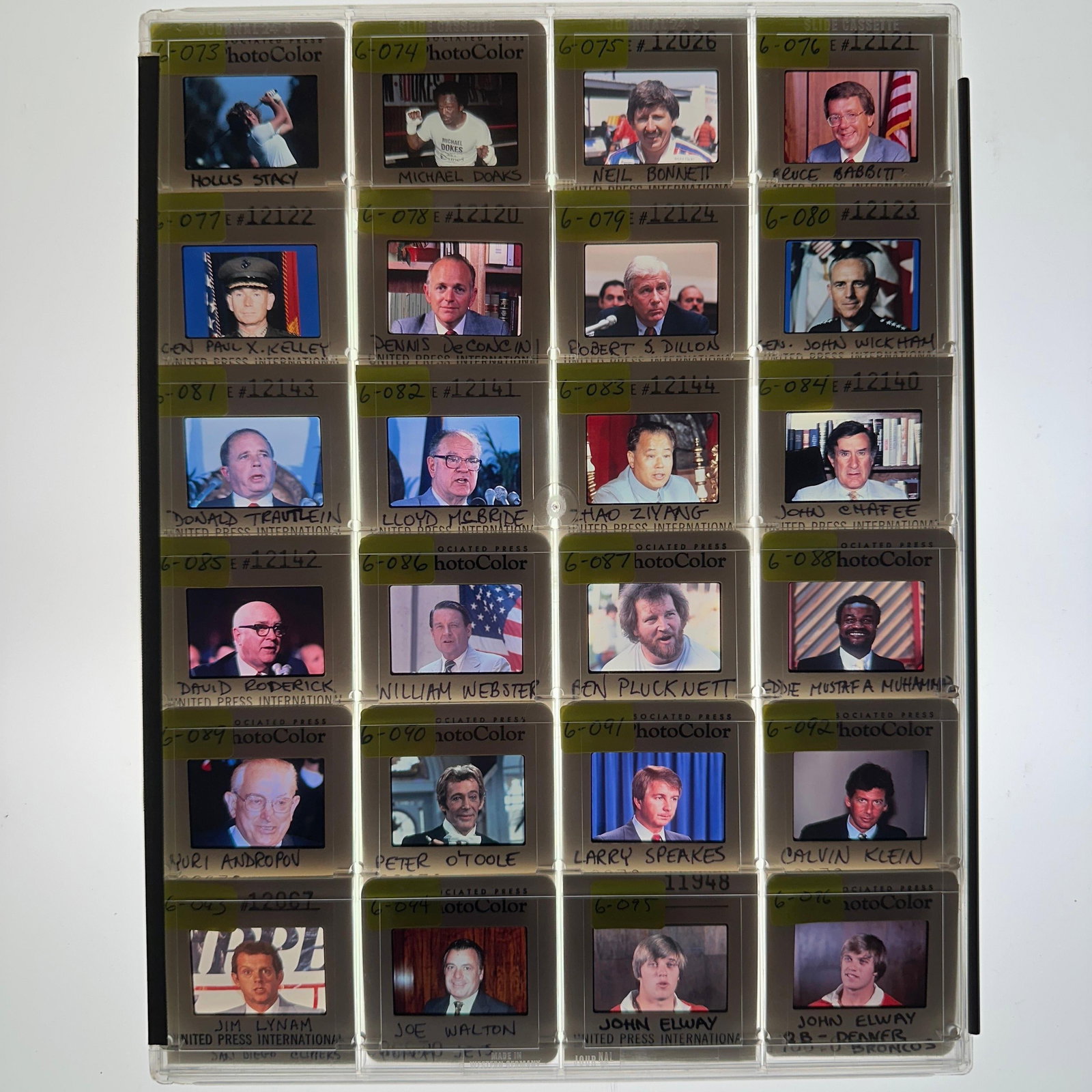 AP and UPI Press Photo Slides John Elway Calvin Klein Political Figures Sports Personalities: Collection of vintage Associated Press and United Press International PhotoColor press slides featuring sports figures, actors, politicians, and public personalities from the late 20th century. Identi