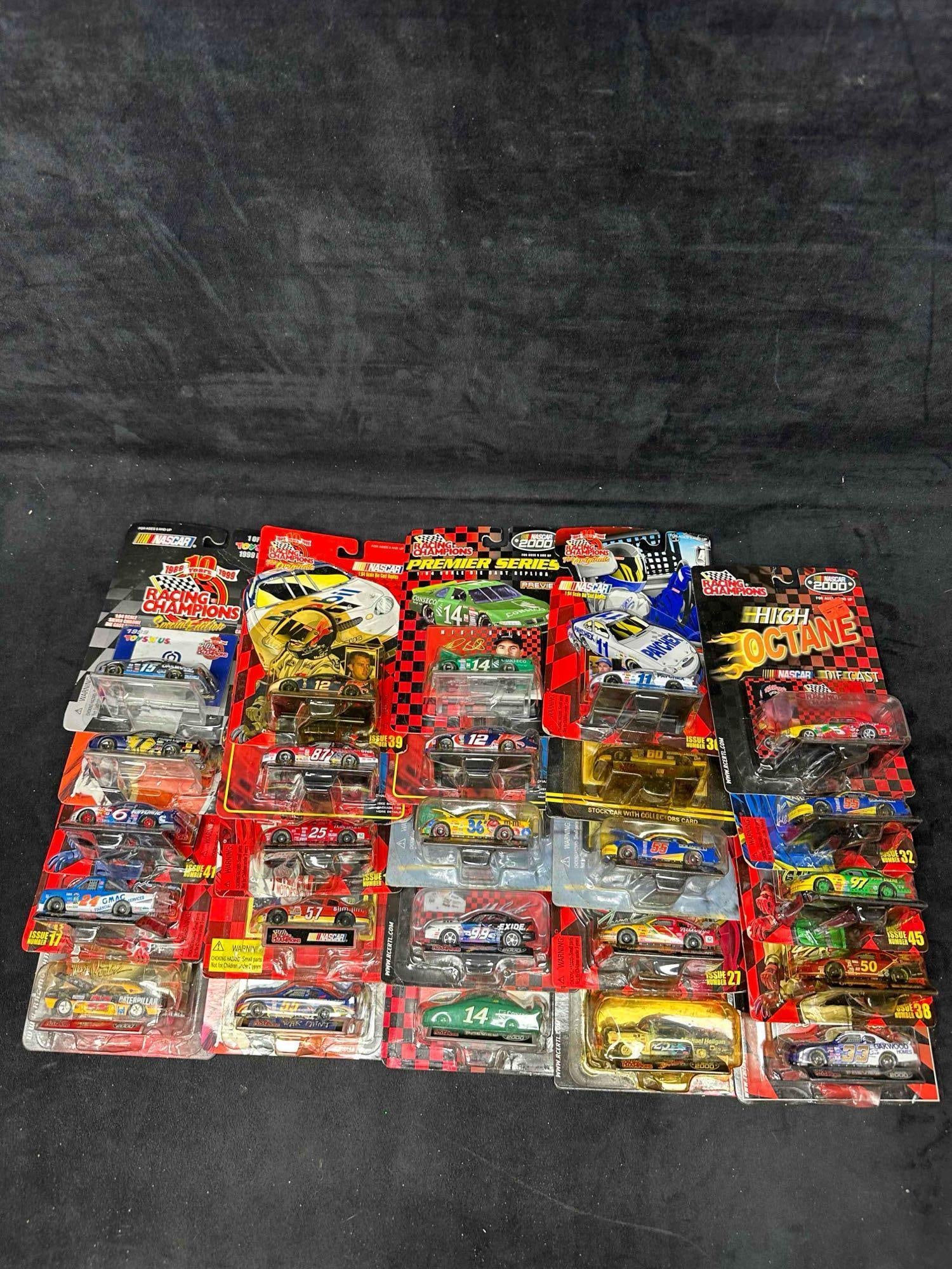 Racing Champions 1:64 Scale Die Cast Replica Lot of Twenty-Five 25 NASCAR Collector Stock Cars: Assorted NASCAR Racing Champions collectibles featuring (25) 1:64 scale die cast cars in original packaging. Various editions include Premier Series, High Octane, War Paint, Chase the Race, and Specia
