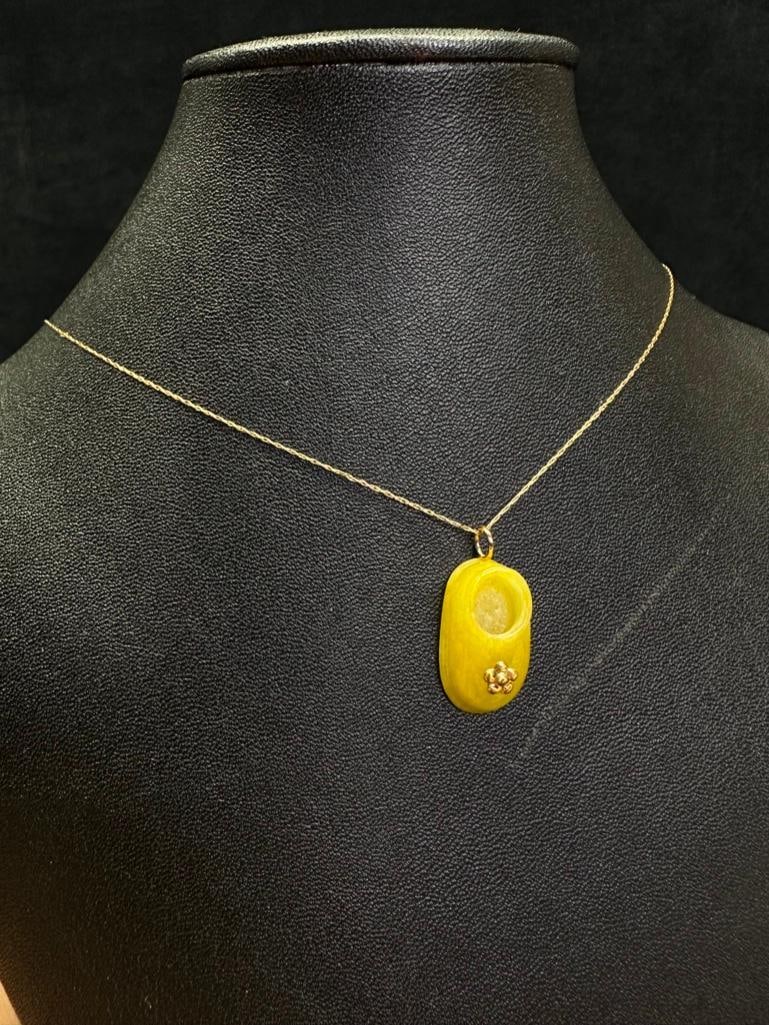 Yellow Jade & 10k Gold Shoe Pendant: This piece of jewelry has been tested and researched prior to listing. Please view all our pictures they are part of our description. DETAILS: Metal - 10k Gold Color - Yellow Gold Stones - Jade 