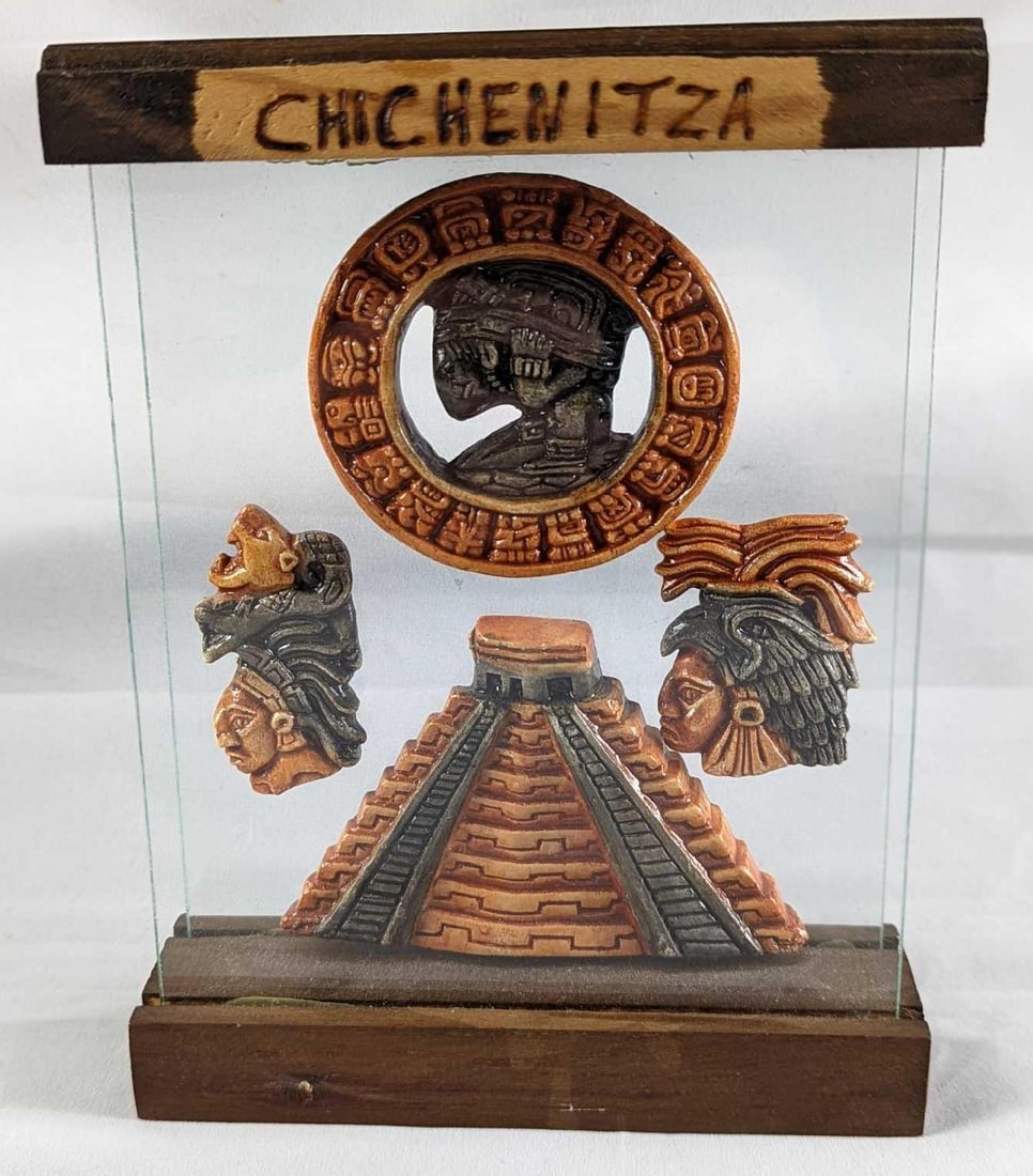 3D Souvenir of Chichen Itza Mexico: This souvenir of Chichen Itza is a stand-up collection of Aztec 3D resin sculptures like the Temple of Kukulcán. The top and bottom of the stand are wood, with the front and back are glass. This 