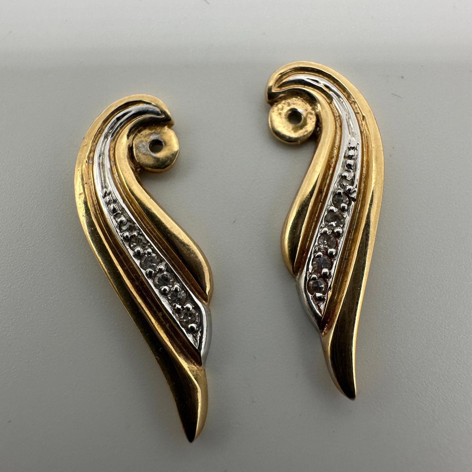 Diamond Accent Earring Enhancers 14K Gold A55: This item is in good pre-owned condition, previously used/displayed, with noticeable light wear and surface scratches. Please reference all photos for full details. This piece of jewelry has been care