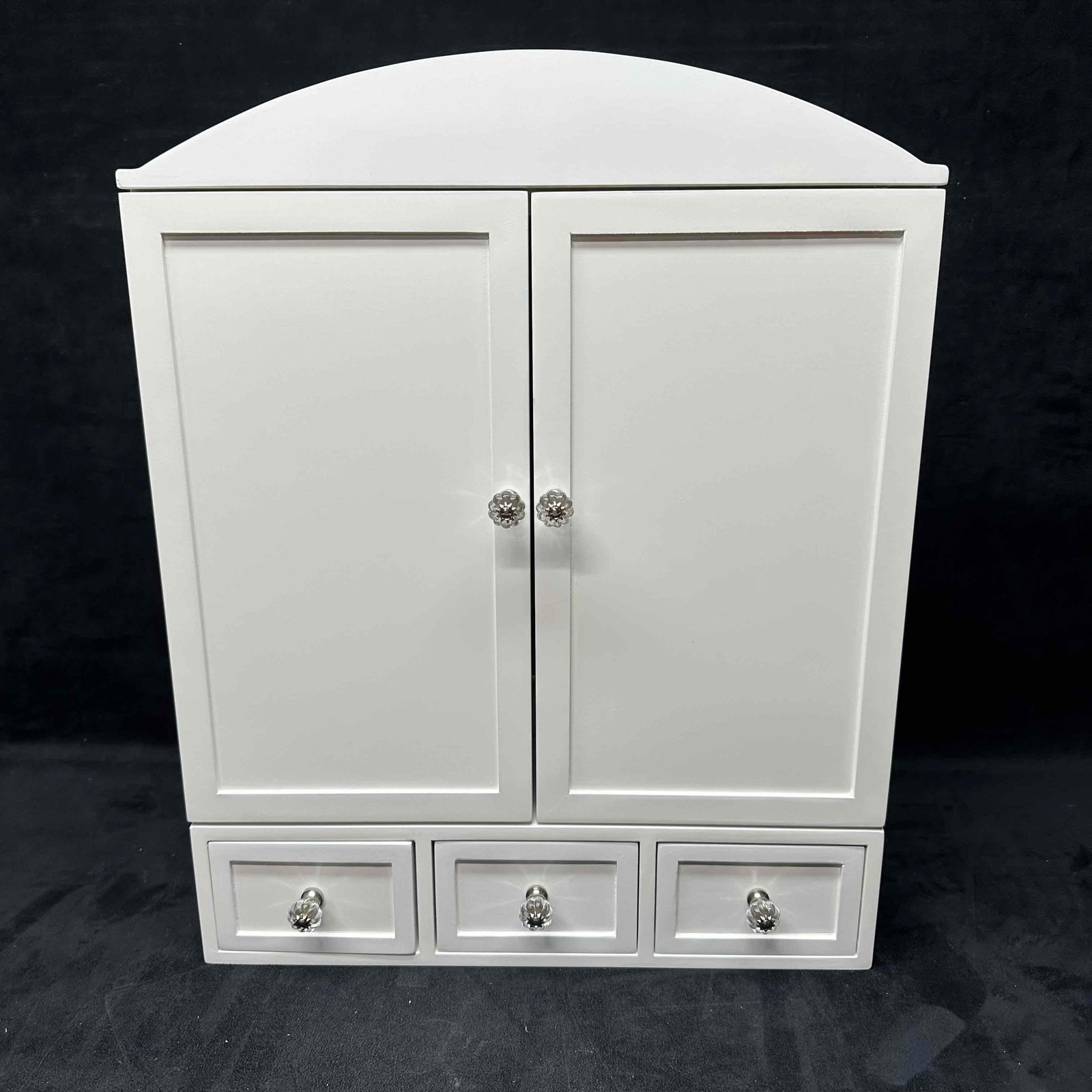 Pottery Barn Kids White Wooden Jewelry Armoire Cabinet with Mirror and Drawers: White wooden jewelry armoire by Pottery Barn Kids, dated 11/2011. This cabinet features double doors that open (magnetic closure) to reveal a mirrored interior, 4 necklace hooks, cushioned ring