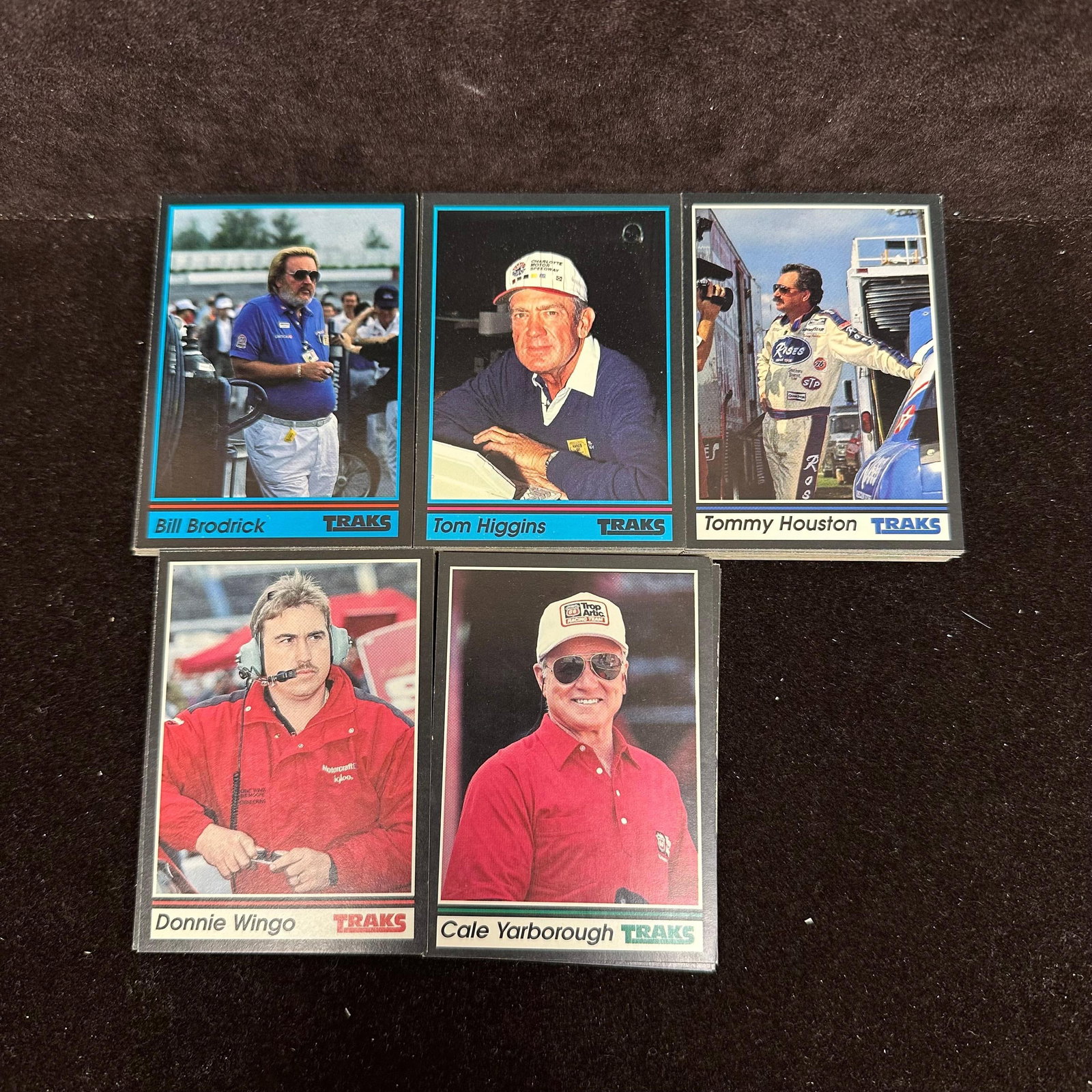NASCAR Racing Trading Card Lot 100 Cards Traks Race 90s: A lot of approx. 100 NASCAR trading cards featuring drivers, including Tom Higgins, Jimmy Means, Jimmy Cox, Cecil Gordon, and others: mixed sets, loose cards, varying condition. The lot includes