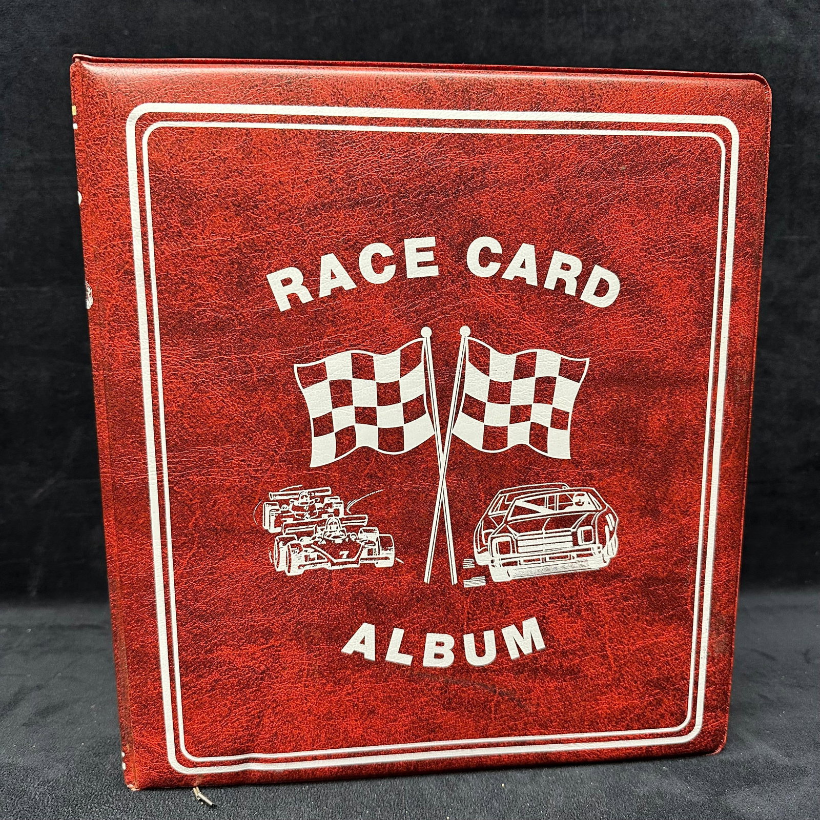 Race Card Album 1990s Pro Set and Traks NASCAR Racing Trading Cards: A binder of NASCAR 1990's trading cards featuring a variety of drivers and brands: mixed sets, cards in sleeves, varying condition. The lot includes duplicates. Mainly Pro Set and Traks. Over 360