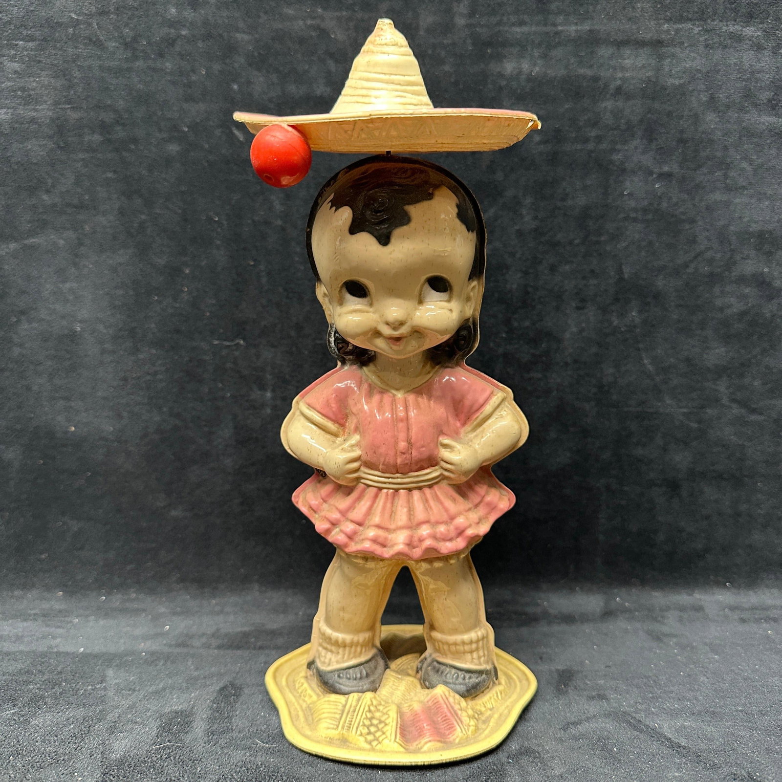 1940s Vintage Mechanical Dancing Senorita Toy Irwin Toys: This is a vintage 1940's Irwin Toys mechanical wind-up dancing senorita plastic doll. Good vintage pre-owned condition with age-related wear and discoloration from use and storage. Please referenc