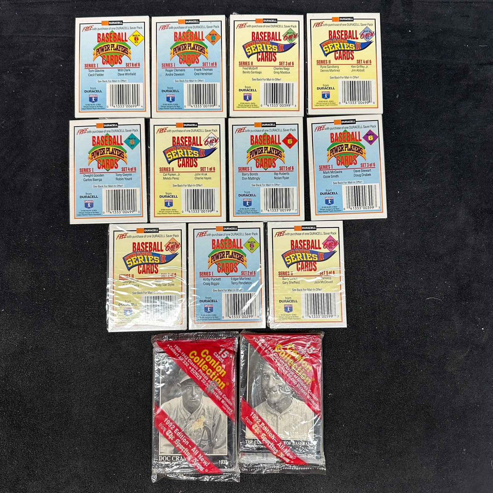 1990s Baseball Card And Promo Pack Collection Duracell Power Players: Group lot of vintage baseball card collectibles and unopened promotional packs from the early 1990s. Includes Duracell Baseball Power Players Series I and Series II card sets featuring players such as