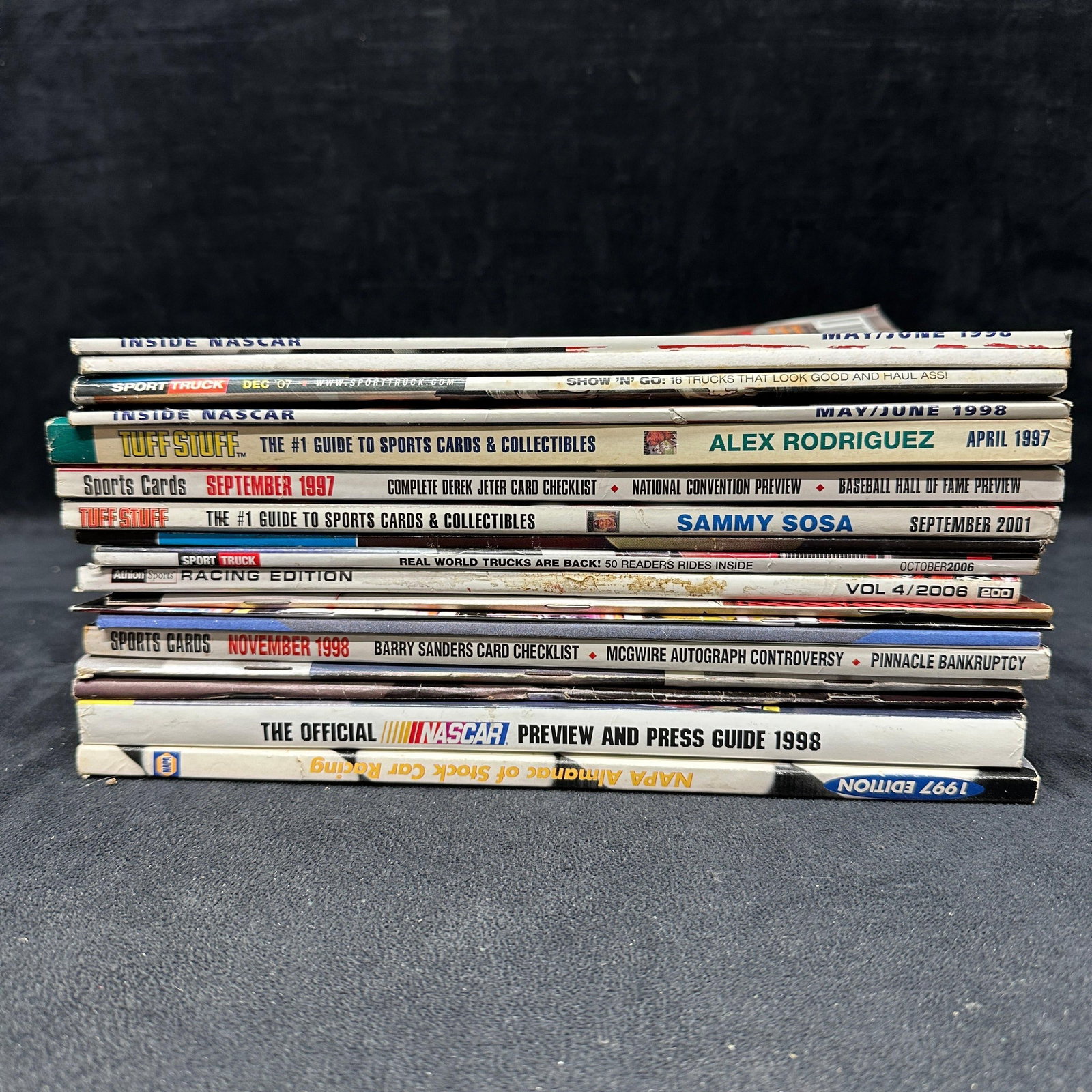 Sports Magazines NASCAR Racing Tuff Stuff Past Retired Issues: A variety of old sports magazines and ephemera collectibles. Magazines show wear, with sticker residue, creases/bends, small rips/tears, and the condition varies from light wear to minor corner and ed