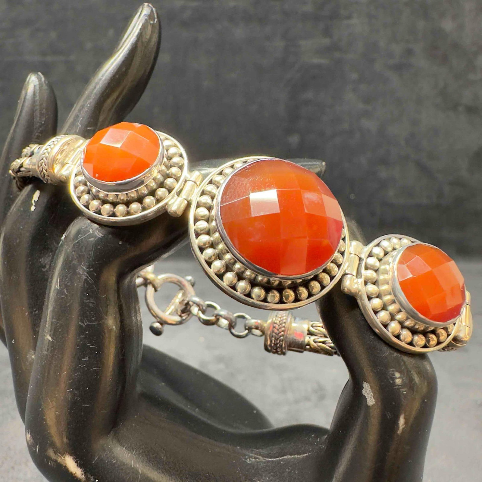 Ba Suarti Indonesia Carnelian Three Cabochon Setting Sterling Silver Bracelet: This item is in good pre-owned, previously used/displayed condition with noticeable light wear, and surface scratches. Please reference all photos for full details. This piece of jewelry has been test