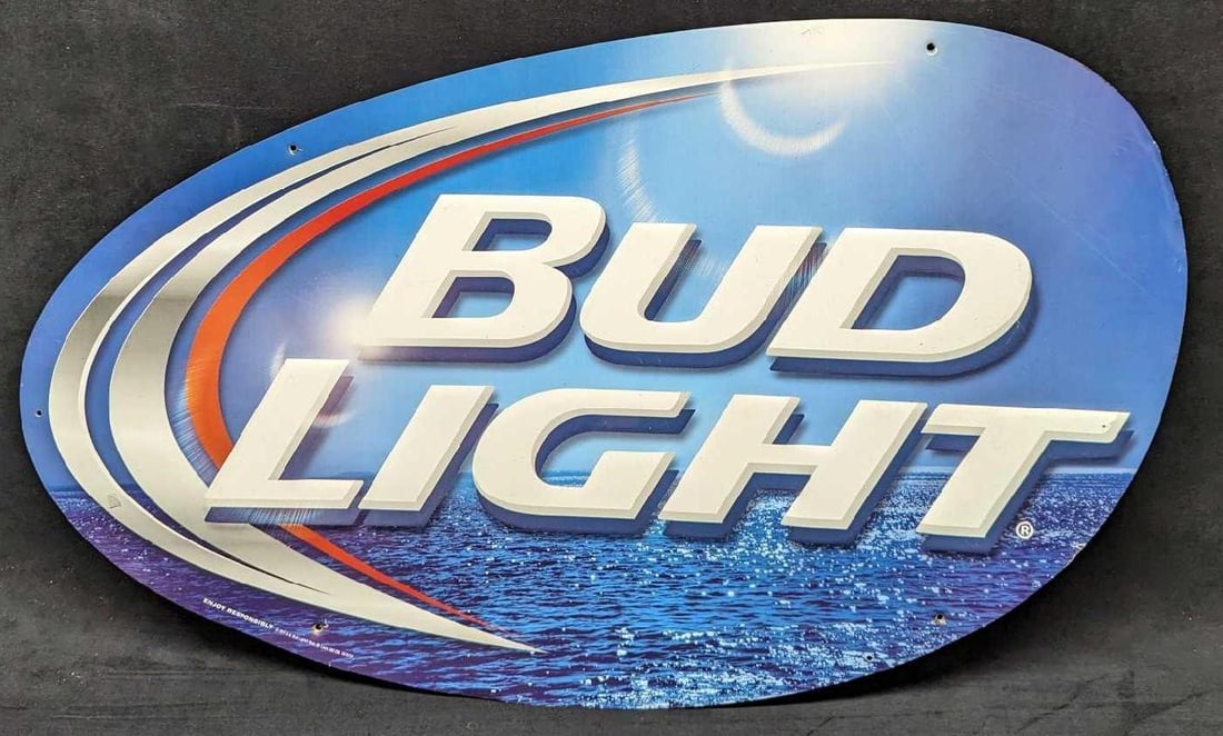 Bud Light Splash Metal Sign: Bud Light Splash Metal Sign. This is approx 29 1/2" x 17 1/2" and it weighs 0.90lb. Ths sign has some markings and creases/dents on the signs.