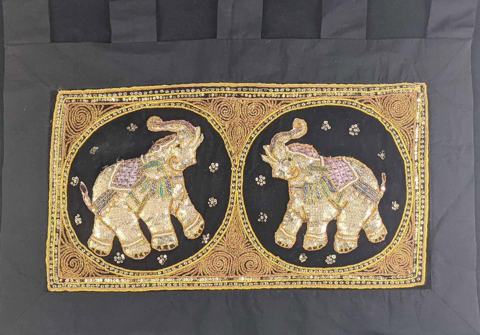Thailand Sequin Elephants Tapestry Wall Hanging: Colorful and embroidered wall hanging is embellished with sequins, beads, and stones. Has two elephants with their trunks raised up, which is a universal symbol of good luck. The maker and date of cre