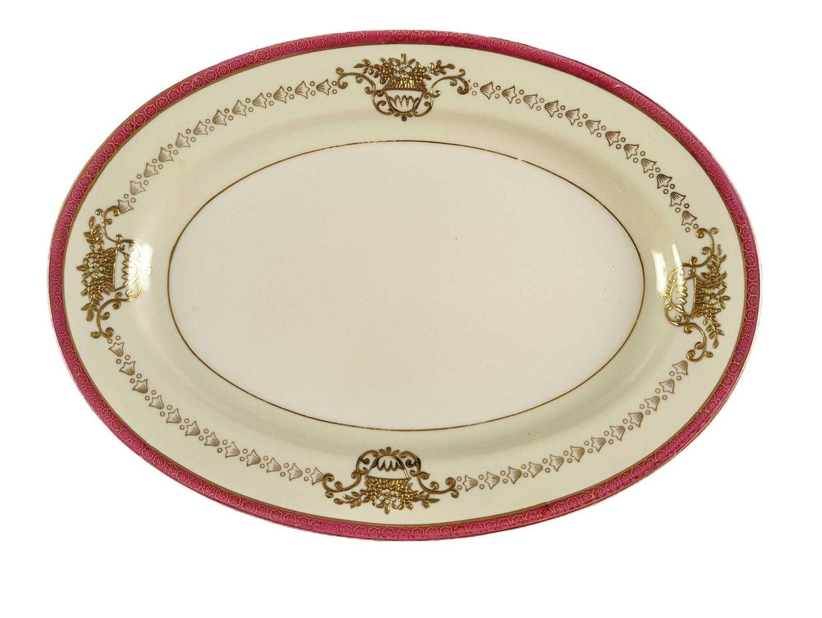 Japanese China Maroon Trim W Gold Inlay 12" Oval Platter: Japanese China Maroon Trim With Gold Inlay 12" Oval Platter. Is approx 12" x 9" x 1 1/4" and it weighs 1.84lb. The platter is in a good, vintage condition with some wear on the trim and a couple of ve