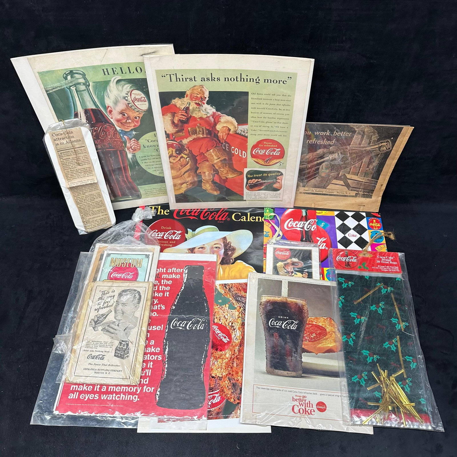 Coca Cola Paper Ephemera Collection Vintage Advertising Prints Promotional Papers: Assorted Coca-Cola paper ephemera collection featuring a mix of vintage and later advertising materials. Includes illustrated magazine and newspaper ads, promotional prints, calendar material, small d
