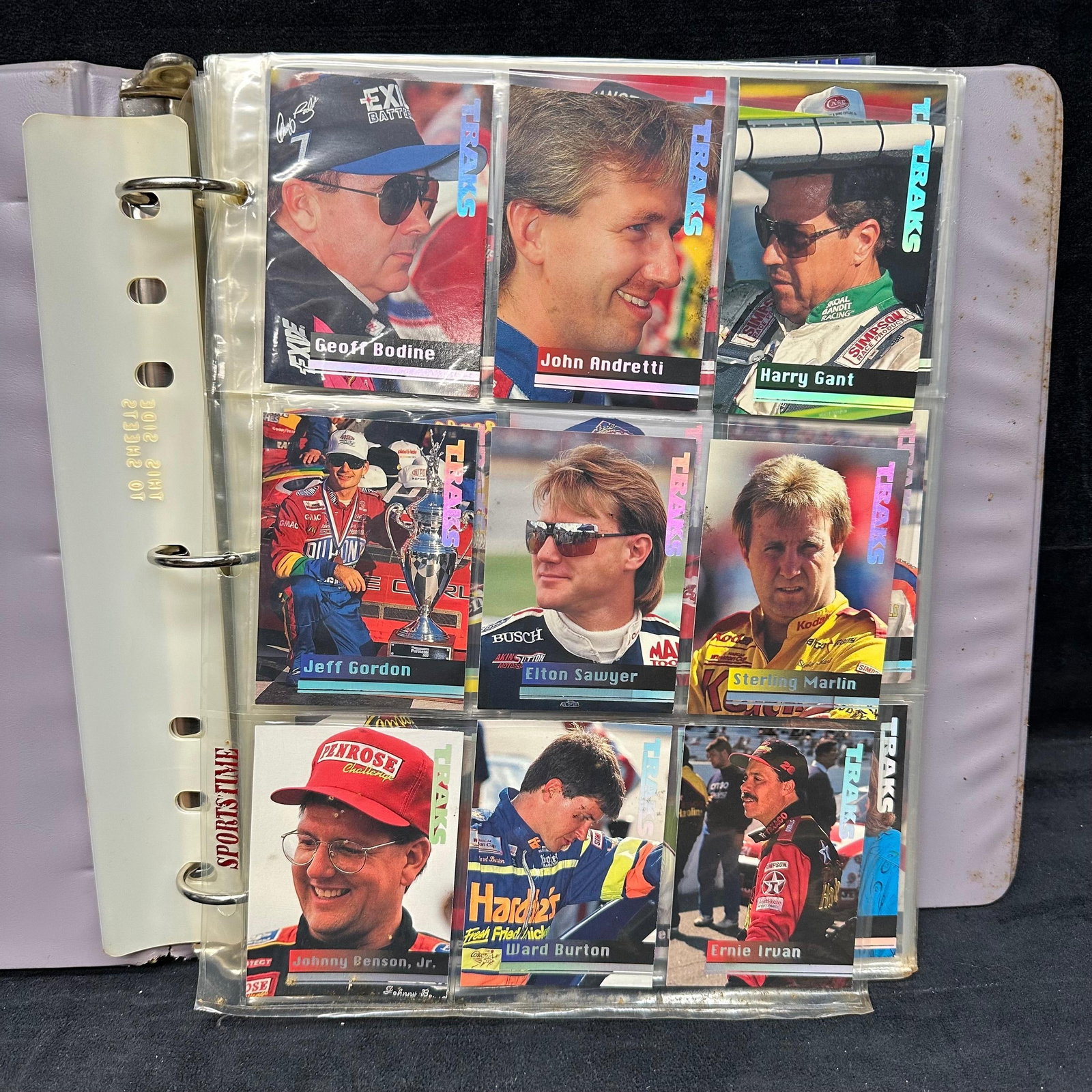 1990s Traks NASCAR Trading Card Collection Binder Drivers and Behind the Scenes Cards: A binder containing a large group of 1990's TRAKS NASCAR trading cards, including driver cards and Behind the Scenes inserts. Notable names include Jeff Gordon, Dale Jarrett, Rusty Wallace, M