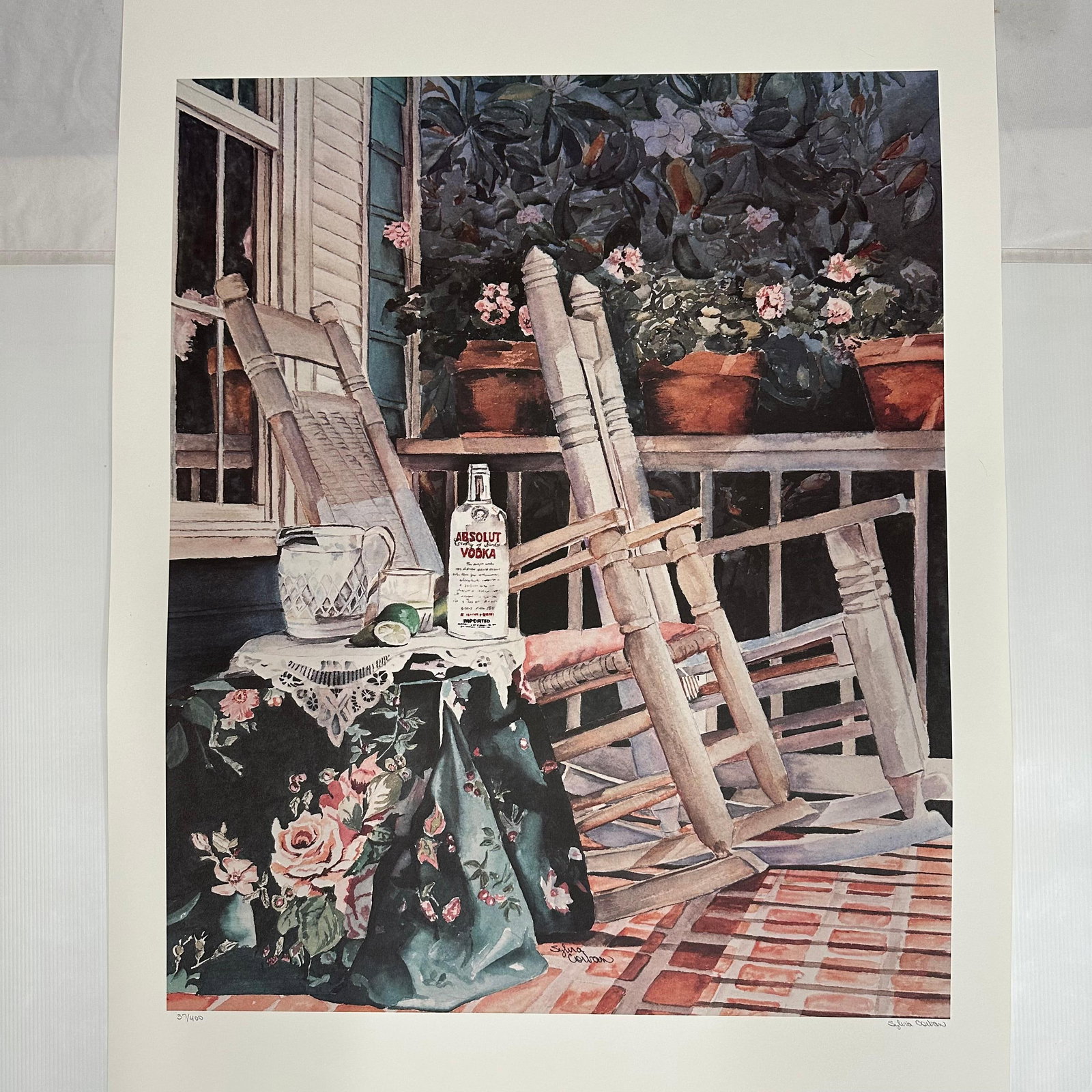 Absolut Vodka Statehood Print Mississippi Sylvia Corban Hand Signed Numbered: Limited edition Absolut Vodka “Statehood” lithograph print on paper. Features the iconic Absolut bottle set against a stylized Mississippi-themed landscape. Hand-signed by the artist,
