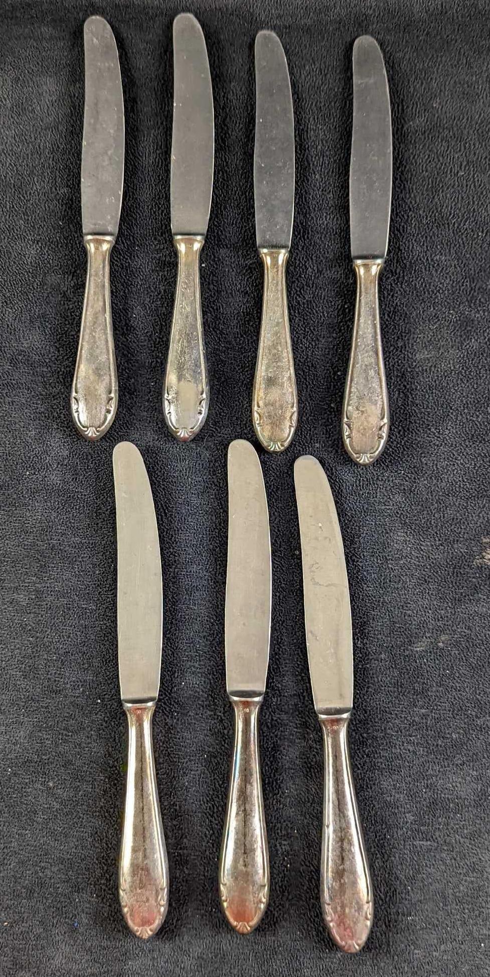 7 8" Retired Vintage BMF Silverplate Knives: Lot of 7 silver-plated knives by Bergische Metallwaren Fabrik in Germany. The knives are marked BMF on the back. In good condition with some tarnish and scratches from wear. Each knife is approx 8 1/4