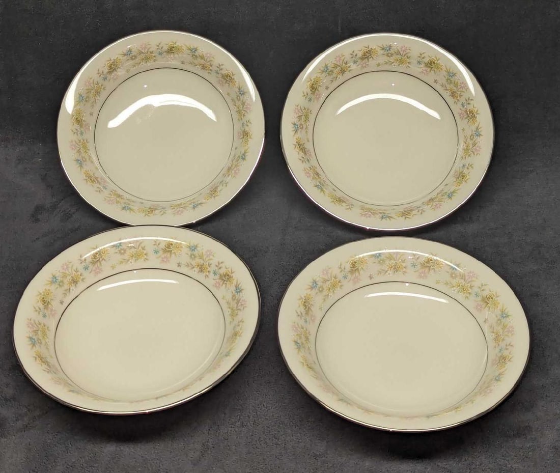 4 Retired Noritake Blossom Time Ivory China Bowls: 4 Retired Noritake Blossom Time Ivory China Bowls. Each is approx 7 1/2" x 71/2" x 1 3/4" and the total weight is 2.79lbs. The "Blossom Time" design was released from the year 1972 to the year 1985.