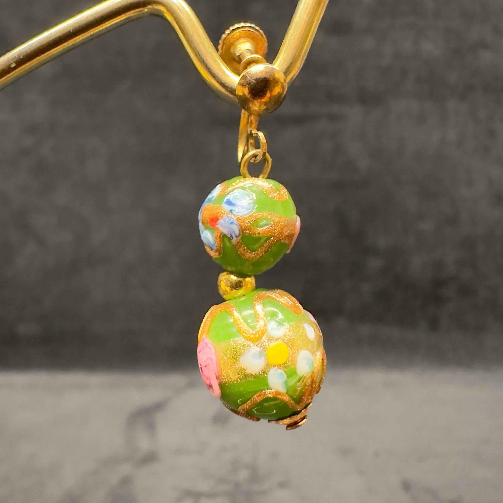 Murano Venetian Lamp Work Art Glass Green Copper Accents Pink Floral Bead Drop Earrings F42: Murano Venetian Lamp Work Art Glass Green Copper Accents Pink Floral Bead Drop Earrings F42. Earrings with green glass beads with beautiful designs on each. The earrings feature pink floral and copper