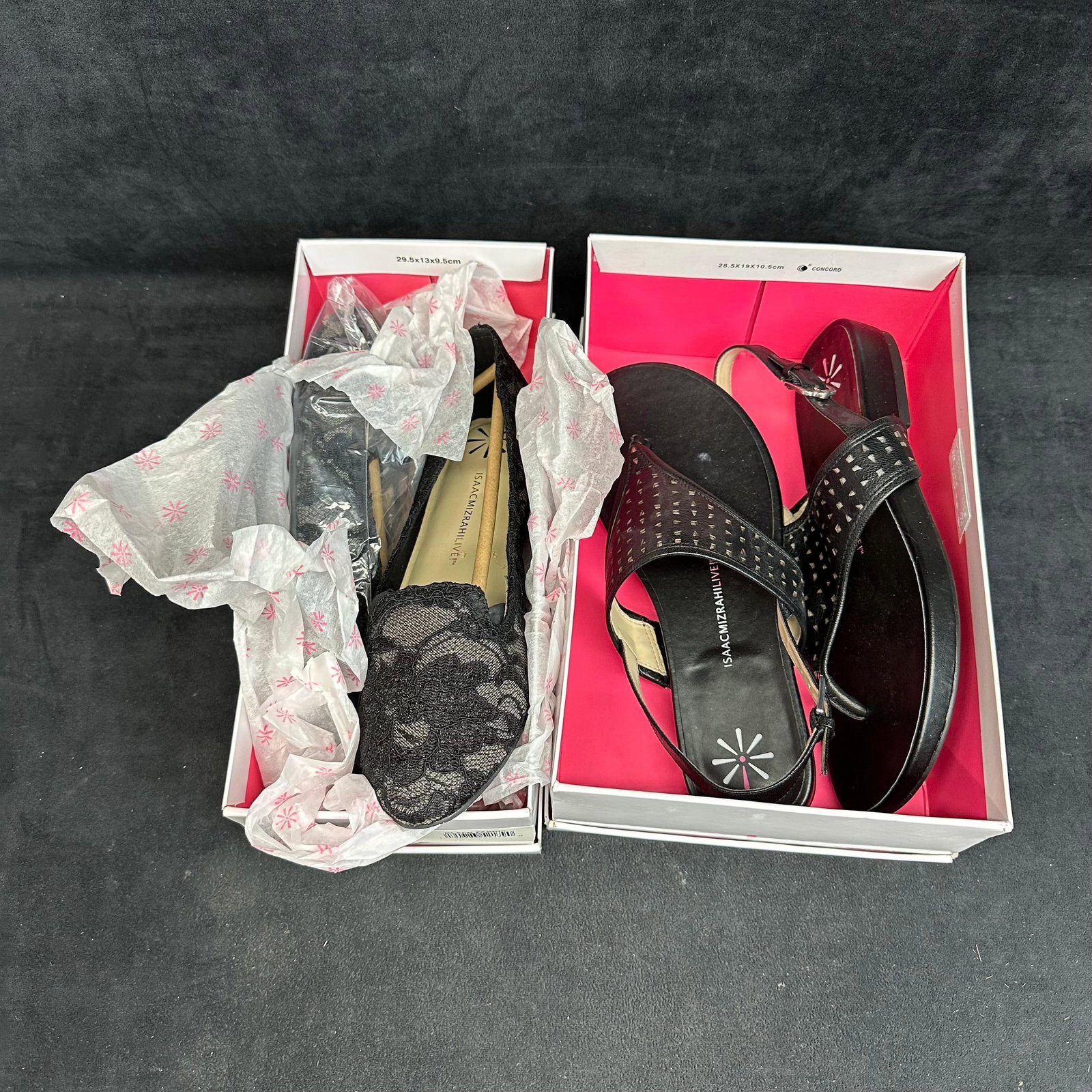 Women’s Shoe Lot 2 Pairs Lacey Black Lace Flats and Taken Black Leather Sandals:  Women’s shoe lot featuring two versatile black pairs, perfect for both casual and dressy looks. Isaac Mizrahi Lacey Flats – Elegant pointed-toe flats with a beautiful black floral