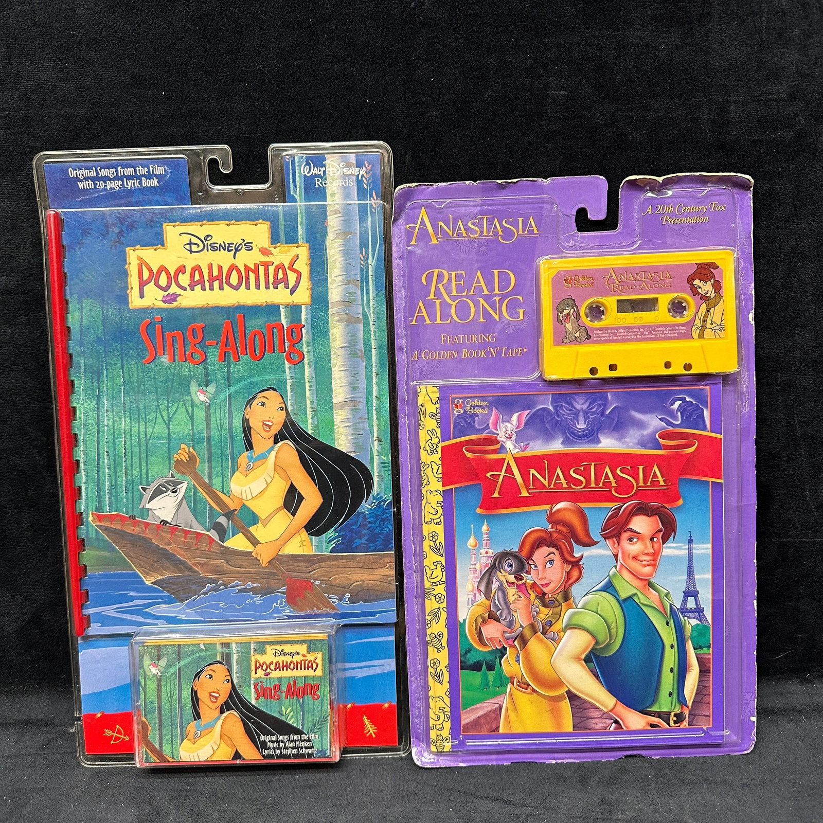 Disney Pocahontas Sing Along and Anastasia Read Along Book And Cassette: Group lot of two vintage children’s read-along books and cassette sets. Includes Disney’s Pocahontas Sing-Along set with an illustrated lyric book and cassette, and Anastasia Read Along fe