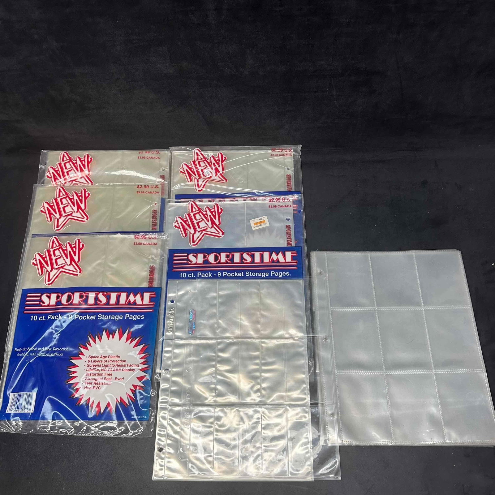 Lot of Sportstime 9-Pocket Storage Pages New and Used Trading Card Protectors: Collection of Sportstime 9-pocket trading card storage pages. Includes several sealed packs (10-count each) along with a group of loose pages. Designed for standard trading cards, each page fits into 