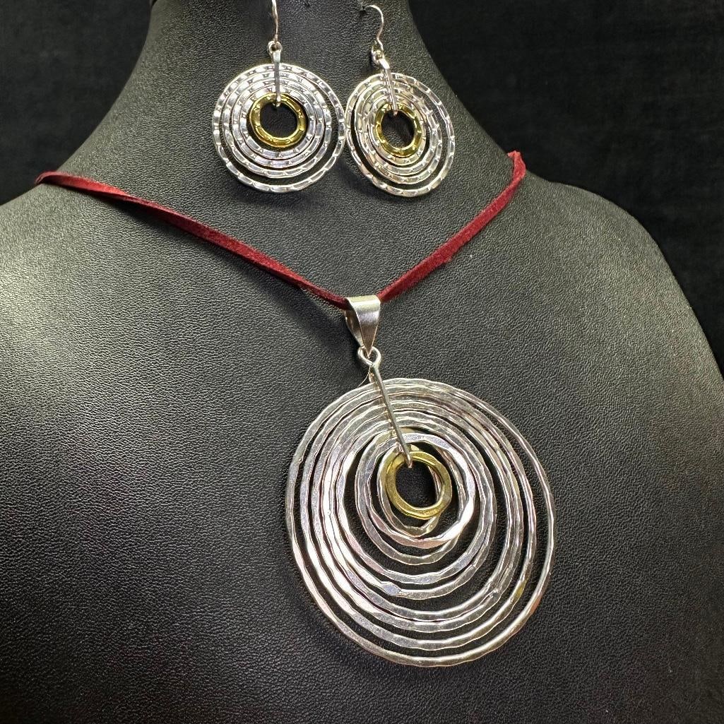 Sterling Silver and Brass Concentric Ring Necklace and Earrings: This piece of jewelry has been tested and researched prior to listing. Please view all our pictures they are part of our description. DETAILS: Metal - Sterling Silver Color -Silver Stones - none Hallm