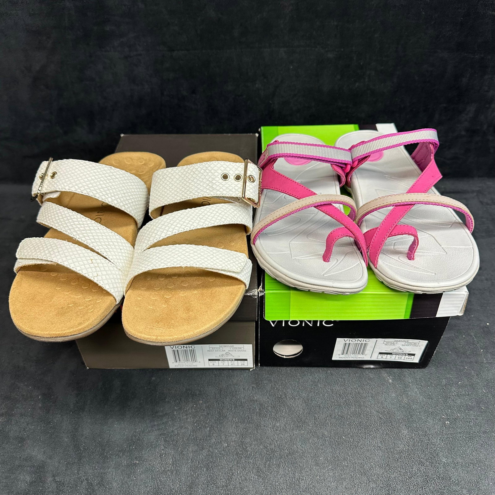 Vionic Women’s Sandals Lot 2 Pairs White Strappy Slide and Pink Gray Active Sandal: Pair of women’s Vionic sandals, both offering premium comfort with orthotic support and stylish versatility. Includes: • Vionic White Strappy Slides – Elegant three-strap design