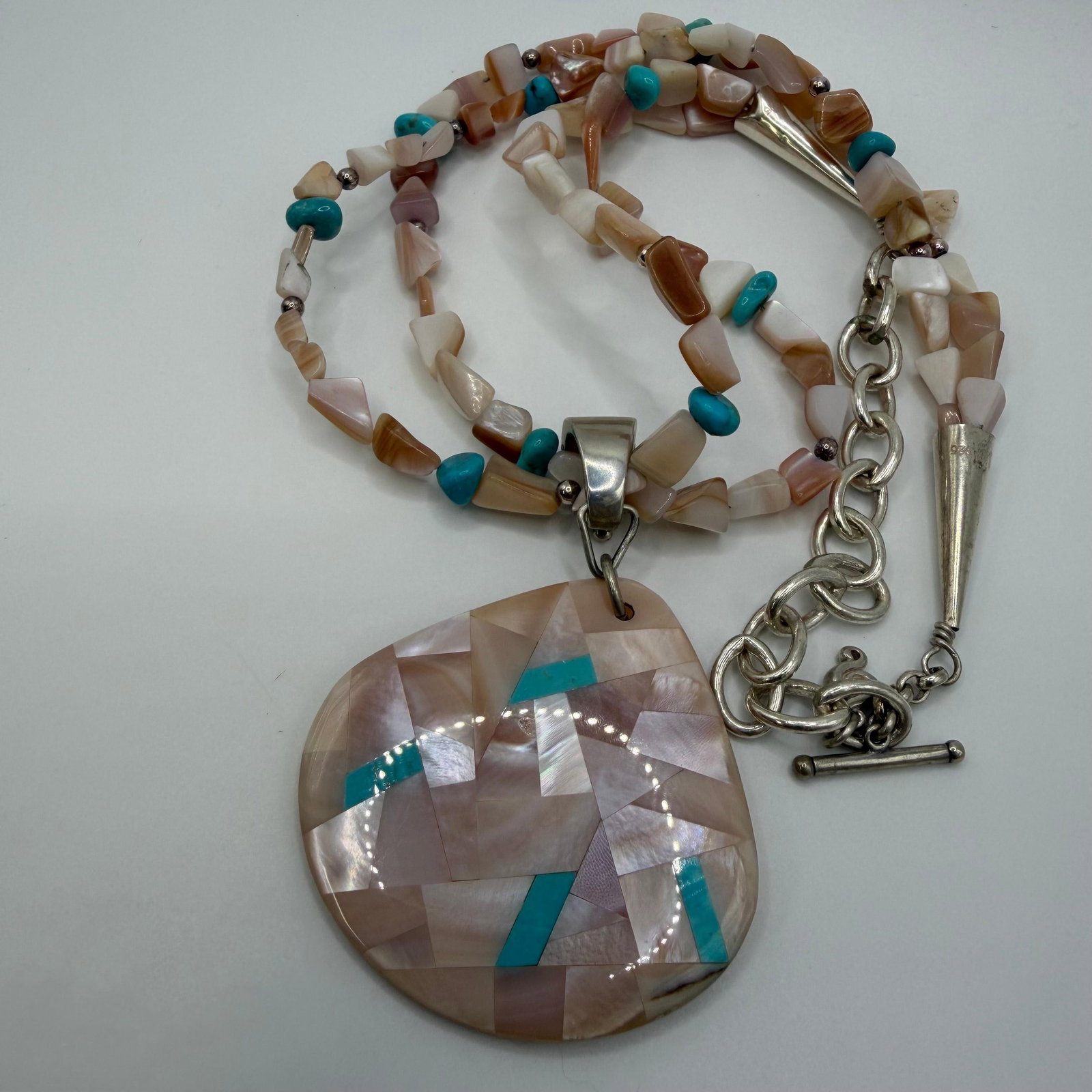 Carolyn Pollack Relios Mosiac Inlaid Mother of Pearl and Turquoise Pendant Sterling 925 Necklace: This item is in good pre-owned, previously used/displayed condition with noticeable light wear and surface scratches. Please reference all photos for full details. This piece of jewelry has been caref
