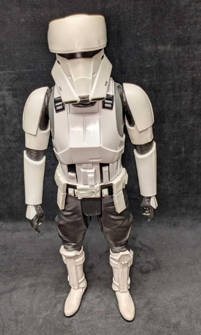 Jakks Pacific Star Wars Large Rogue One Hover Tank Driver: Jakks Pacific Star Wars Large Rogue One Hover Tank Driver. This is approx 7 1/2" x 3 3/4" x 18 3/4" and it weighs 1.03lb. There are some markings on the action figure. This was released in the year 20
