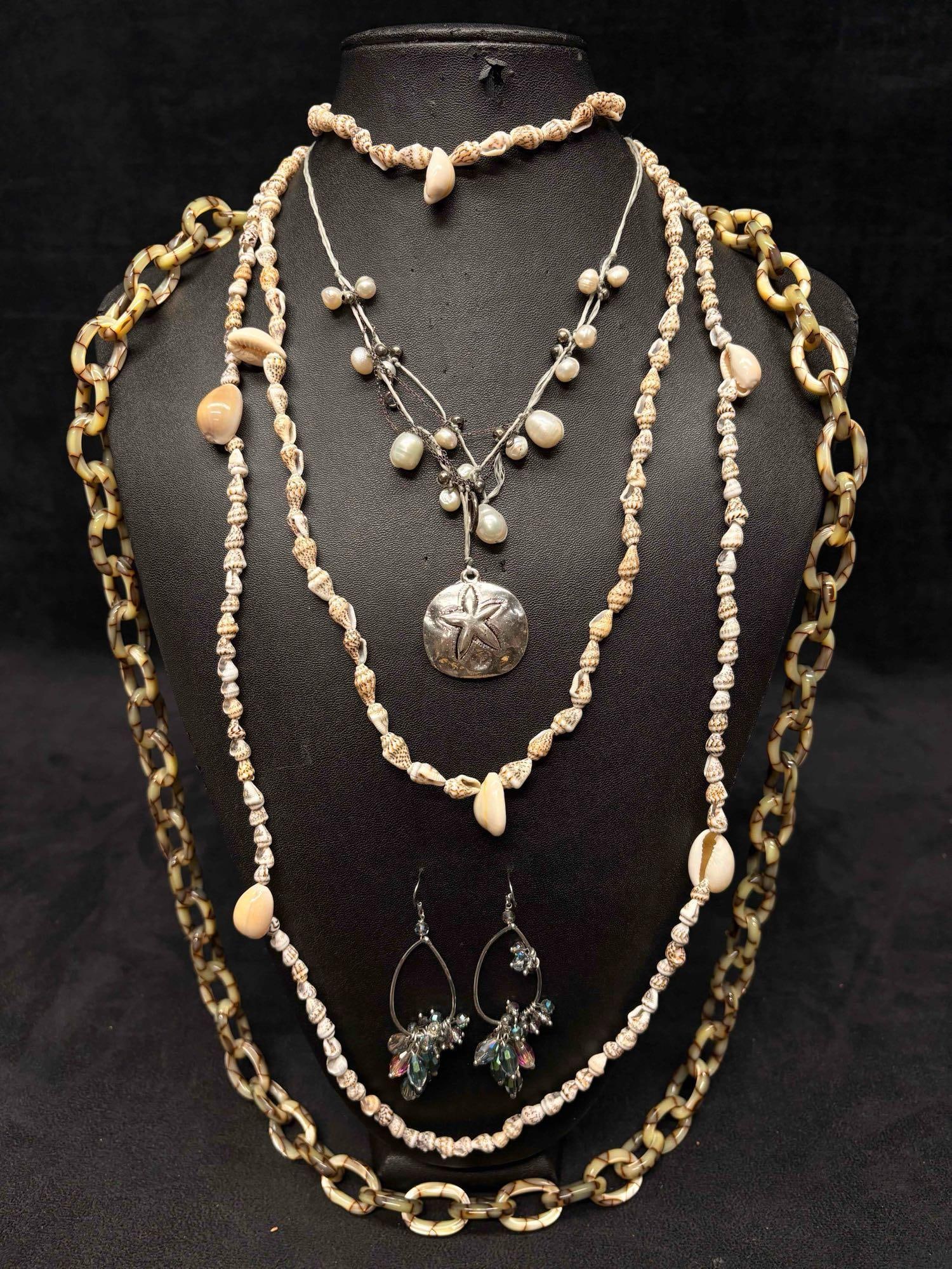5pc Washed Ashore Mixed Costume Jewelry Lot: This lot contains 5 pieces of costume jewelry, all of which in overall good condition with minor flaws due to age and use. Please refer to the images provided for full context of the lot's