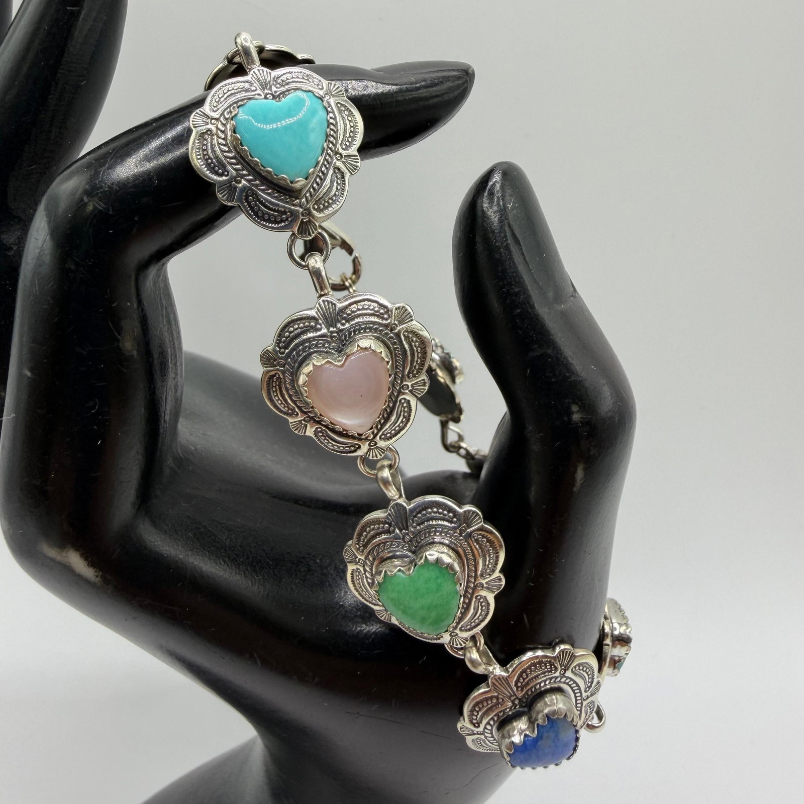 Quoc Turquoise QTC 925 Sterling Silver Multi-Stone Heart Link Bracelet: This item is in good pre-owned, previously used/displayed condition with noticeable light wear and surface scratches. Please reference all photos for full details. This piece of jewelry has been