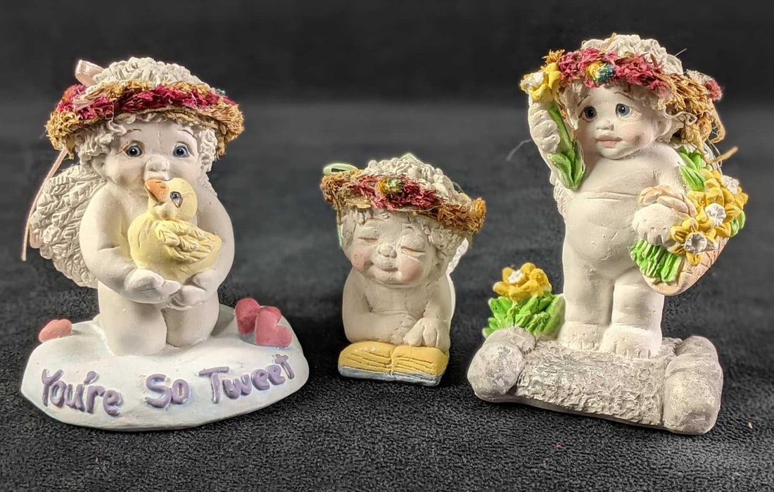 Three Dreamciles Baby Figurines (1) "My First Reader" (2) "You're so Tweet" (3) "Daffodil Days": Three Dreamciles Baby Figurines (1) "My First Reader" (2) "You're so Tweet" (3) "Daffodil Days" (1) Baby with a book "My First Reader" 2" x 2