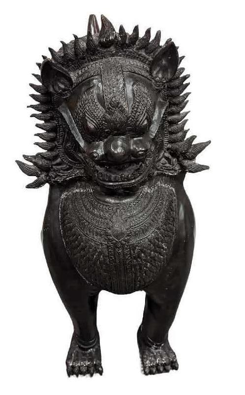 Large Bronze Khmer Style Foo Dog Statue A: Large Bronze Khmer Style Foo Dog Statue A. It is approx 15" x 17" x 40" and it weighs 148.50 lbs. Is in a good, vintage condition with some wear, chips, and color loss on the patina. 