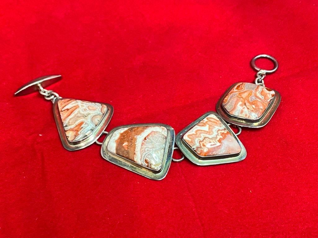 Sterling Silver Lace Agate Toggle-Clasp Bracelet: This piece of jewelry as been tested and researched prior to testing . Please view all our pictures they are part of our description. DETAILS: Metal - Sterling 925 Color - Silver Stones - Lace Agate