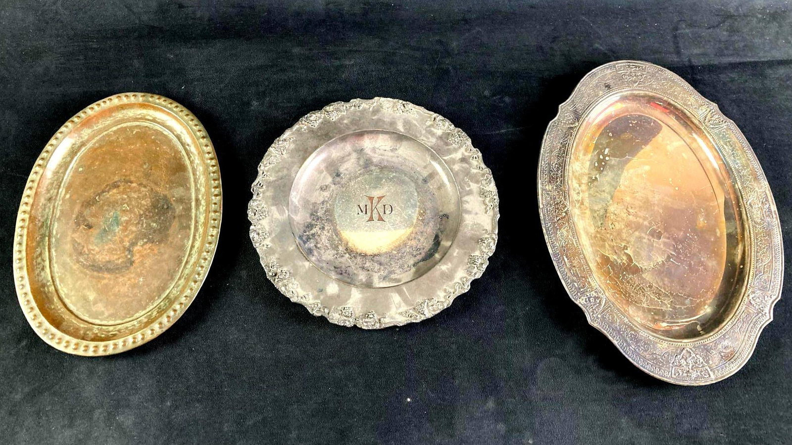 Set of (3) Silver Plate & Tin Platters: This lot includes: (3) Imported Silver Plate and Tin Platters Condition is used and refer to photographs for additional details. One of the imported platters appears to have been imported from Persia