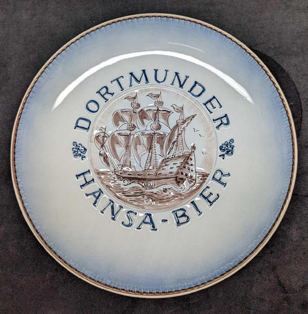 Vintage West German Dortmunder Hansa Bier Plate: Vintage West German Dortmunder Hansa Bier Plate. This was made in West Germany by Ulmer Keramik. Is approx 13" x 13" x 2" and it weighs 2.27 lbs. Is in a good, vintage condition with a chip