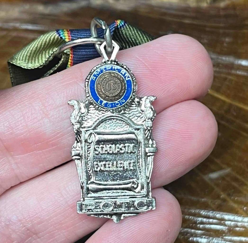 Vintage American Legion Scholastic Excellence Medal ROTC: This lot contains a Vintage American Legion Scholastic Excellence Medal ROTC. This award is given to students in Reserve Officers’ Training Corps programs for outstanding academic achievement. T