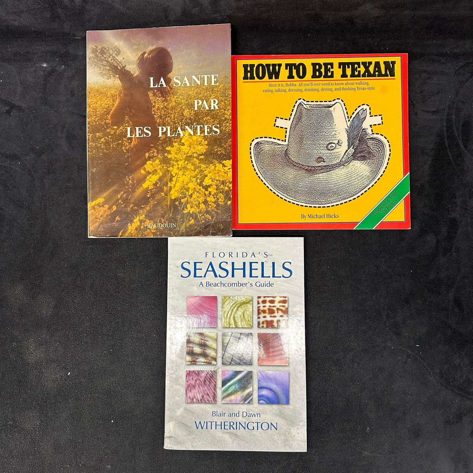 Three Collectible Books Texan Seashells and Baudouin: These items are in good pre-owned, previously displayed condition with light wear and surface markings. Please reference all photos for full details. Measurements: 9 1/4" x 8" x 1". Weight