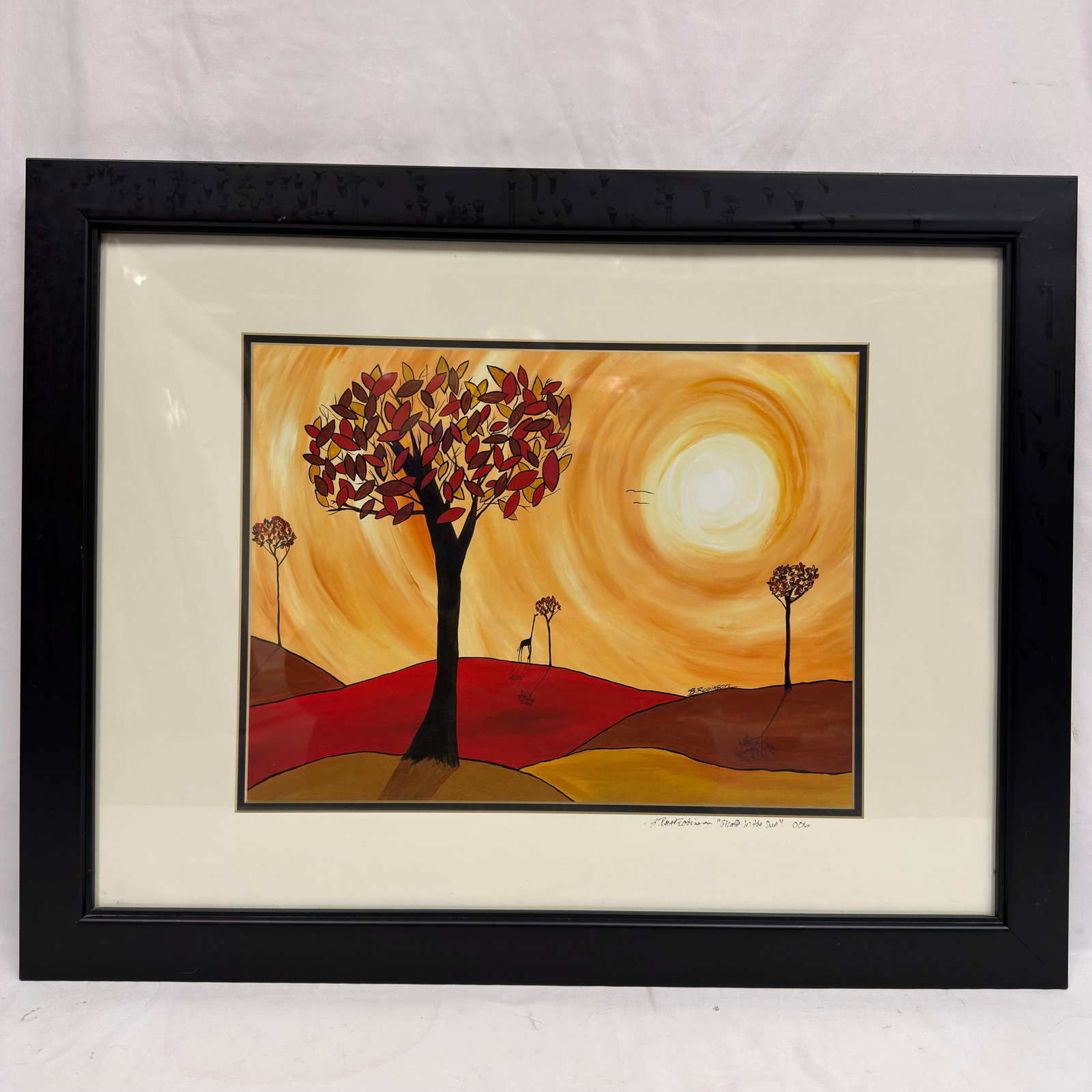 B. Robinson Giraffe in the Sun Framed Art Print Signed: Framed contemporary art print titled "Giraffe in the Sun" by B. Renee Robinson, dated 2006. The vibrant composition depicts a stylized landscape with a giraffe beneath a glowing sun and autumn