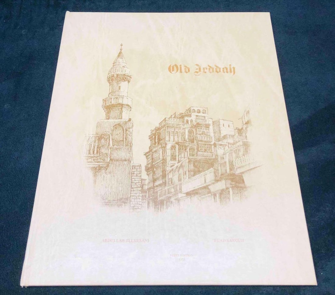 Old Jeddah By Abdullah Telmesani & Fuad Sarouji First Edition 1983: This lot contains Old Jeddah By Abdullah Telmesani & Fuad Sarouji First Edition 1983. It is approx 12 3/4" x 10 1/2" and it weighs about 1.5lbs. Overall the First Edition is in good used condition wit