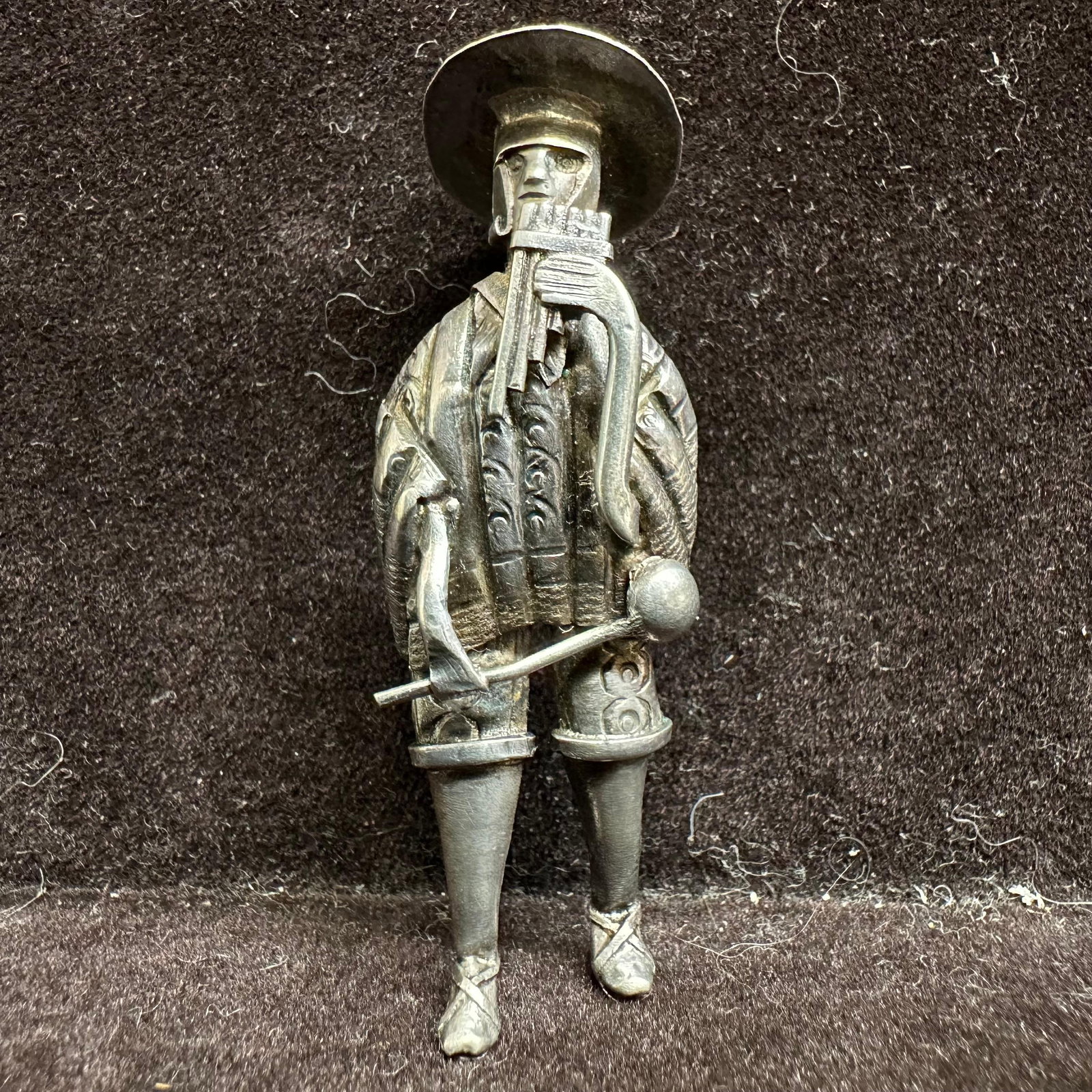 Mexican Style Musician Silver Man Figure Brooch: This item is in good pre-owned, previously used/displayed condition with noticeable light wear and surface scratches. Please reference all photos for full details. This piece of jewelry has been teste