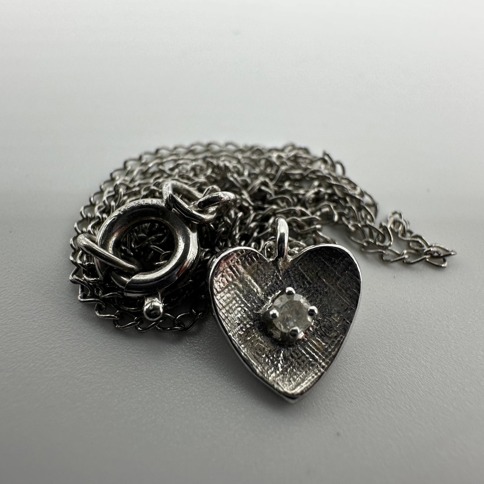 Diamond Heart Sterling Silver Necklace Q93: This item is in good pre-owned, previously used/displayed condition with noticeable light wear and surface scratches. Please reference all photos for full details. This piece of jewelry has been teste