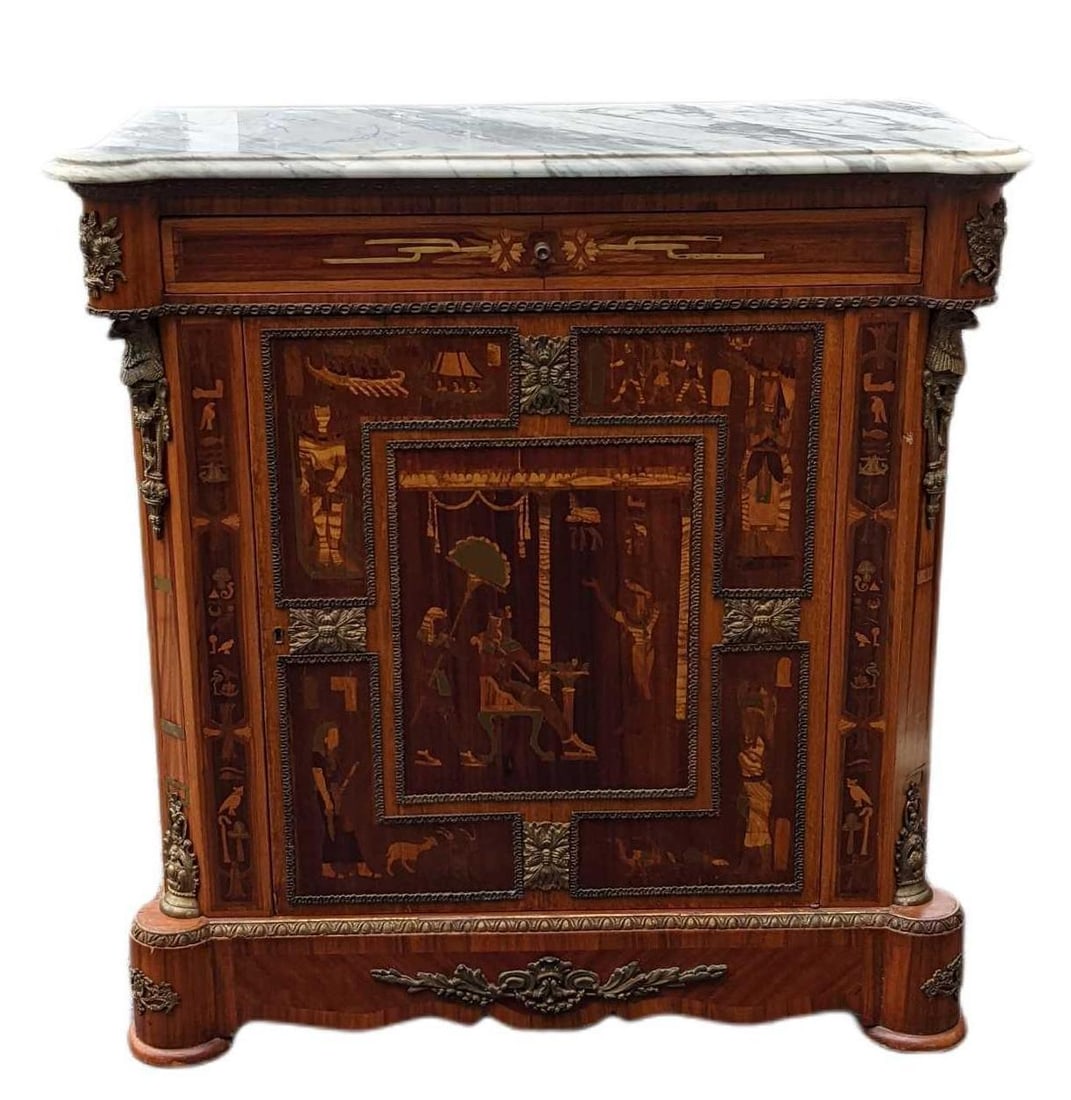 Vintage Cherry Wood, Marble & Brass Sideboard: Vintage Cherry Wood, Marble, And Brass Sideboard. The Cherry wood sideboard has a very unique Egyptian Pharaoh-themed wooden inlay which photos do not do it justice! The main drawer can be locked with