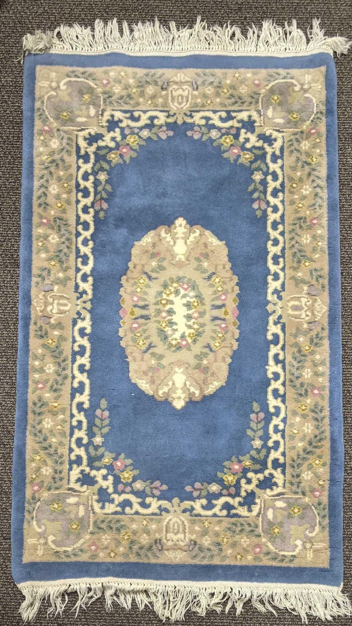 Vintage Hand Woven Wool Chindia Rug Wool Rug: Vintage Hand Woven Wool Chindia Rug Wool Rug This beautiful rug was hand woven in India. This rug has a tag proving it's authenticity. This is a sturdy rug in good condition. The color is a l