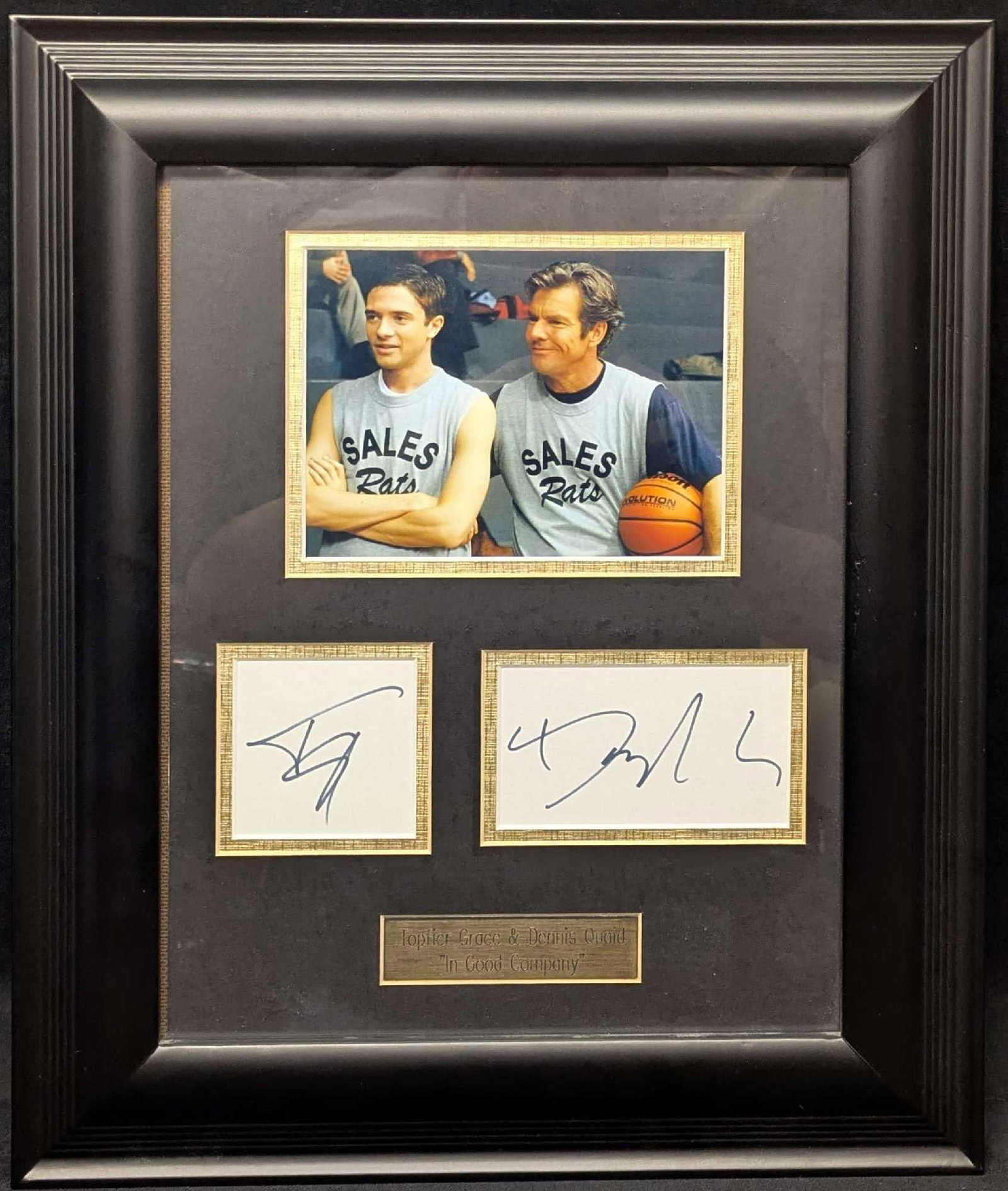 Topfier Grace And Dennis Quaid Autographed White Cards Good Company: Topher Grace Grace And Dennis Quaid Autographed White Cards Good Company. This comes with a COA from Starstruck Entertainment. The framed autographs are approx 18 1/4" x 15 1/4" x 1 1/4" and it weighs