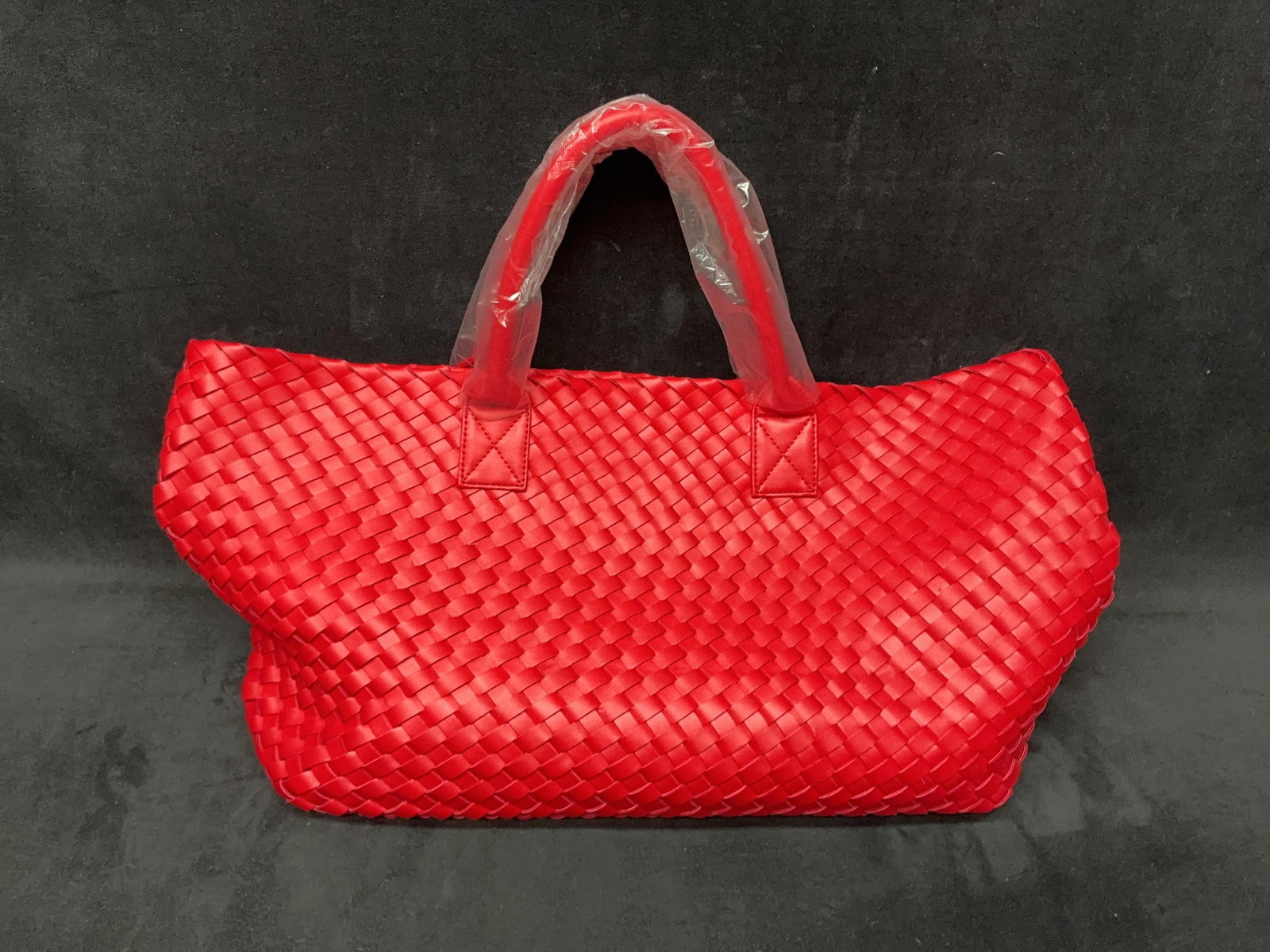 Red Woven Leather-Style Tote With Wallet: Red woven leather-style tote bag with dual handles and included wallet. Please see photos for best description of condition. Approximate Weight: 2 pounds .51 ounces. App