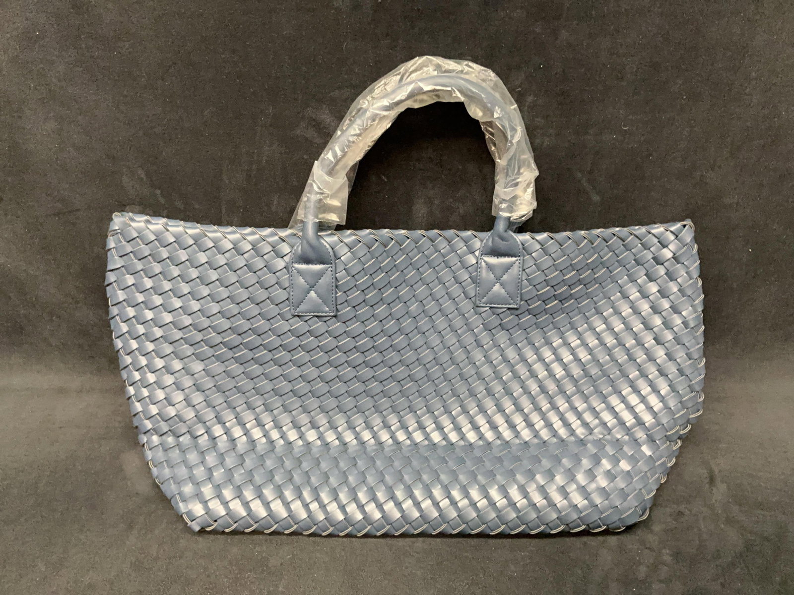 Yellow Faux Leather Woven Tote Bag: Deep blue woven leather-style tote bag with dual handles. Appears unused with protective wrapping present on handles. Please see photos for best description of condition. Appr