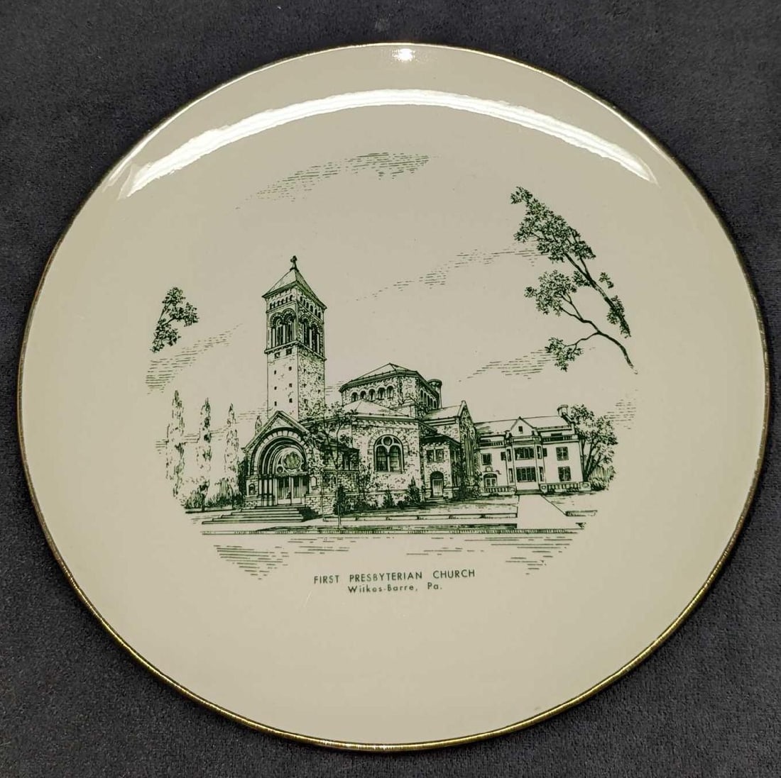 Vintage First Presbyterian Church Plate: Vintage First Presbyterian Church Plate. The ceramic plate was made by Homer Laughlin. The plate is approx 10 1/4" x 10 1/4" x 1" and it weighs 1.16lb. There is some wear on the gold trim.