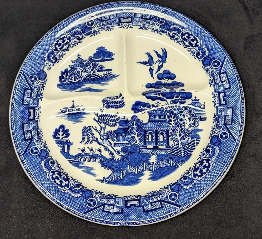 Vintage Blue Willow Separated Fine China Plate: Vintage Blue Willow Separated Fine China Plate. This is approx 11" x 11" x 1" and it weighs 1.71lb. The plate has markings on the front and back and does not have any chips or cracks.