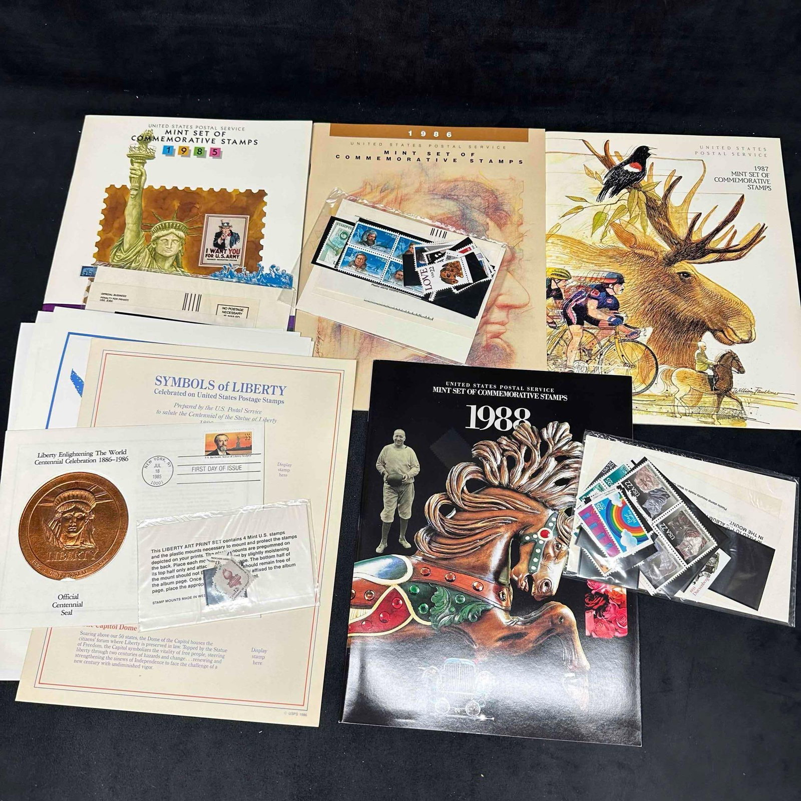 Mixed Lot US Commemorative Stamps Mint Set Postal Service Albums: Some sets include US Stamps, booklets, and other collector pieces. Five sets included from the 1980's. Some booklets do not included any stamps just facts and information for collectors. These ite